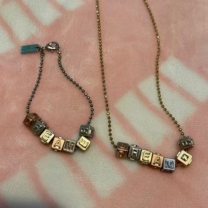 Coach dreamer necklace